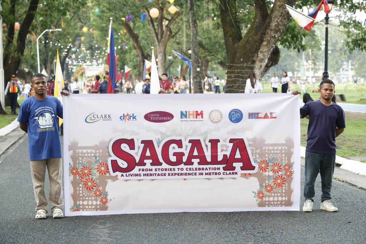 Colorful SAGALA procession with traditional Filipino queens and marching bands in Clark Freeport streets