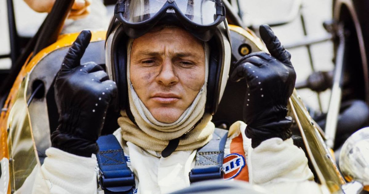 McLaren Formula 1 race car on track celebrating historic 1000th Grand Prix start milestone