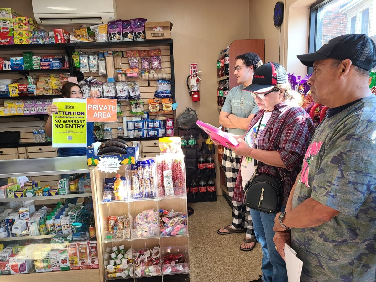 ** Business window displays 4th Amendment Workplace sign supporting employee constitutional rights in North Carolina