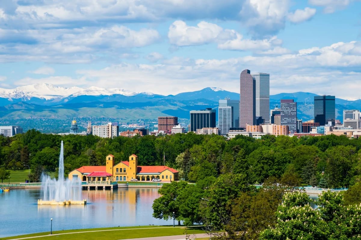 Aerial view of Denver cityscape with modern buildings and infrastructure representing clean energy innovation