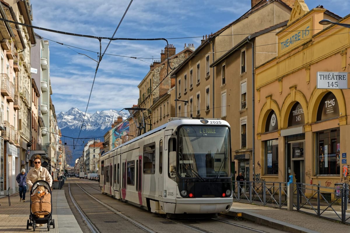 ** Tree-lined bicycle path in Grenoble, France, where advertising billboards once stood