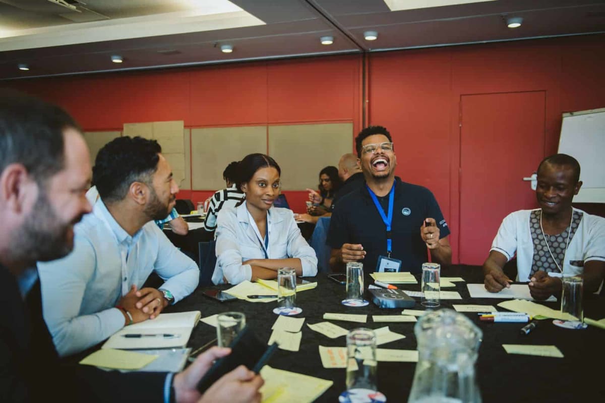 Business professionals networking at Ocean Innovation Africa Summit in Durban's convention center