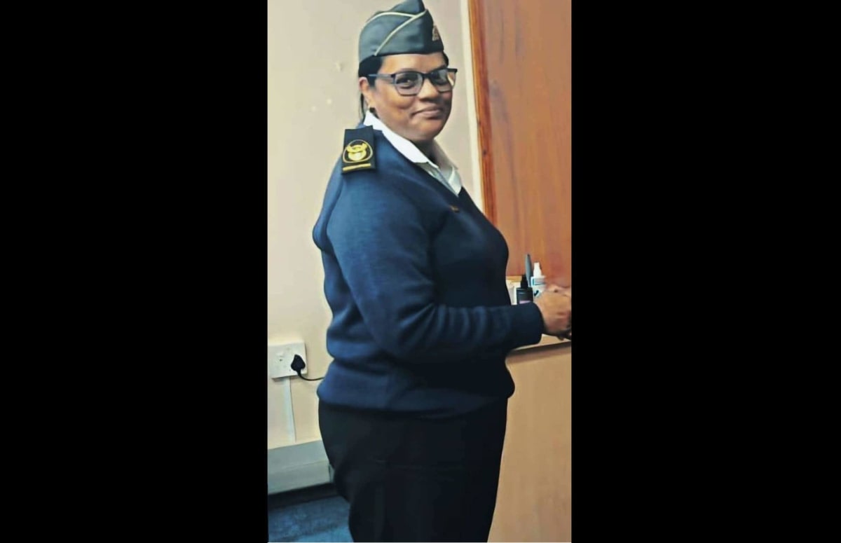 South African Navy Warrant Officer Dianne Pillay in uniform celebrating historic promotion