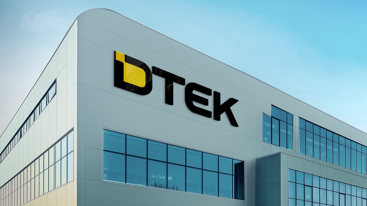 Wind turbines standing against blue sky representing Ukraine's renewable energy future and independence