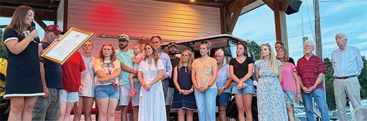 Del. Hillary Pugh Kent presents Virginia resolution to family of firefighter Robert Keyser