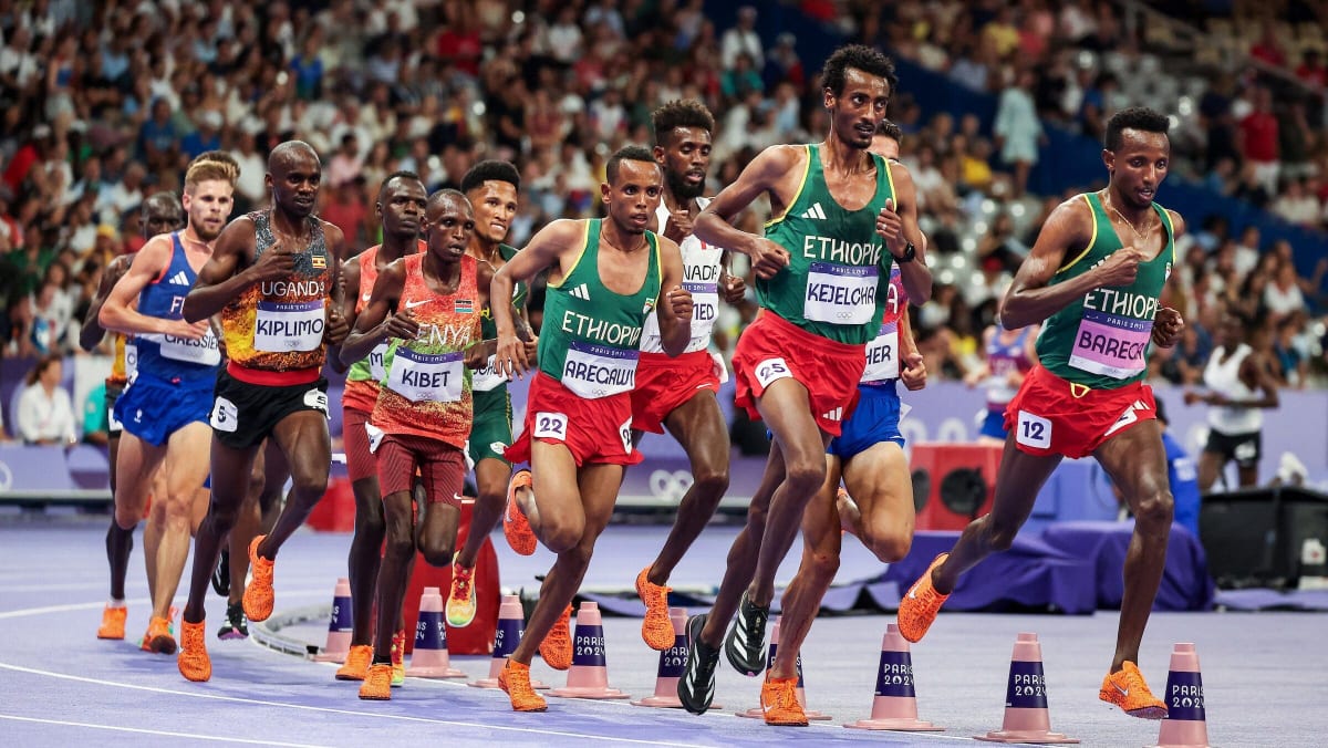 Ethiopian distance runner Yomif Kejelcha competing in a professional race on the track