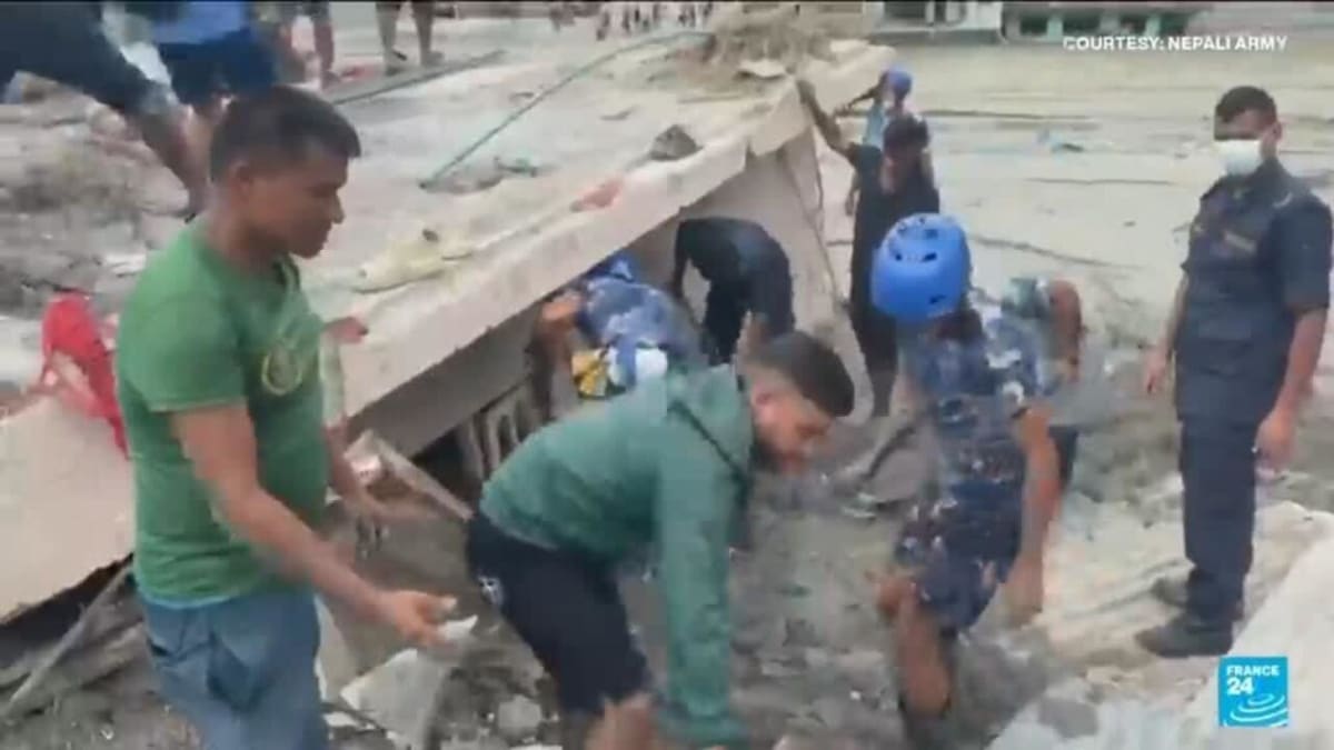 Rescue workers at collapsed tunnel site in Nepal Himalayan mountain valley