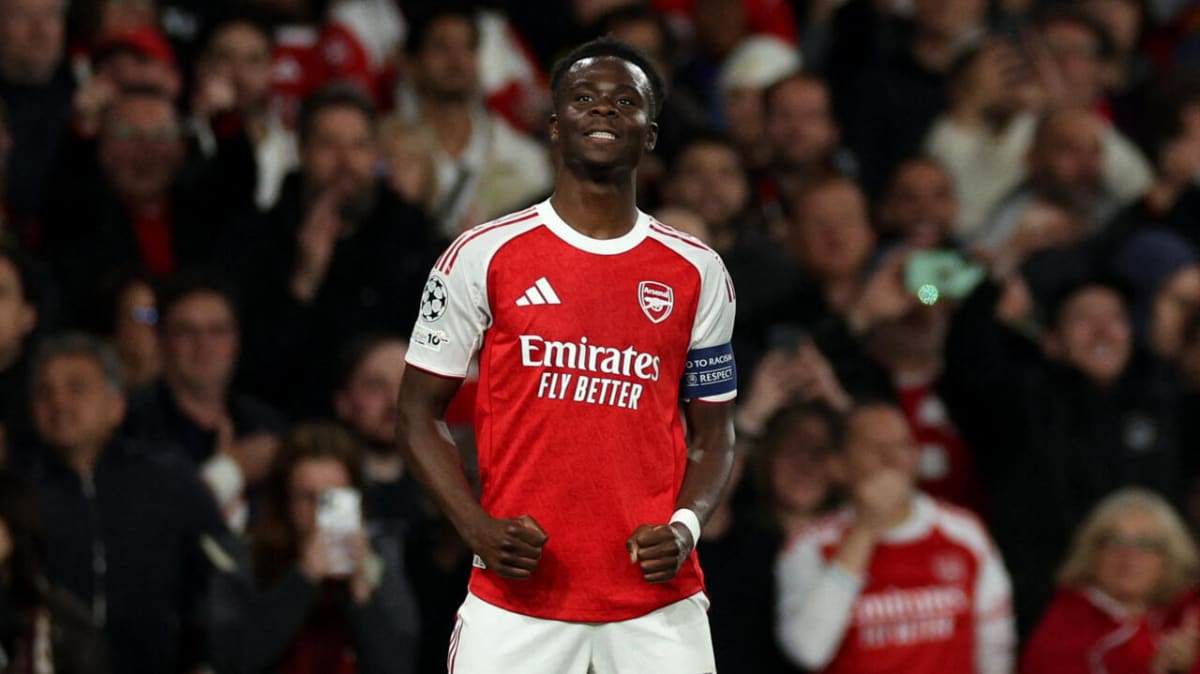 Bukayo Saka celebrates scoring Arsenal's winning goal against Atletico Madrid at Emirates Stadium