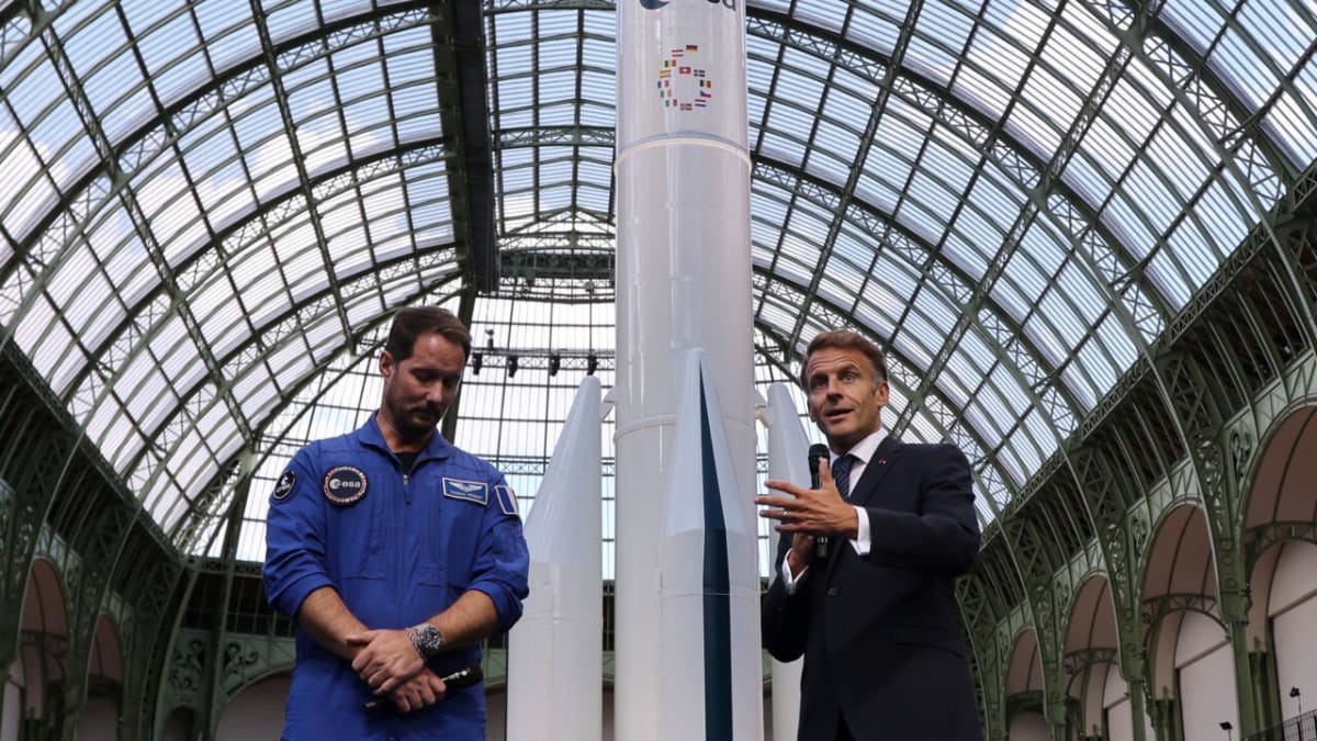European Space Agency astronaut Thomas Pesquet standing with French President Macron at Paris space summit