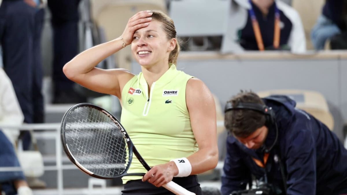Maja Chwalinska celebrates on tennis court at French Open after historic semifinal victory