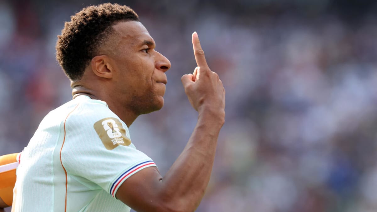 Kylian Mbappé celebrating after scoring his eighth World Cup goal against Morocco