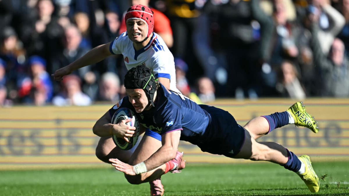 Scotland's Darcy Graham diving over the try line scoring against France at Murrayfield Stadium
