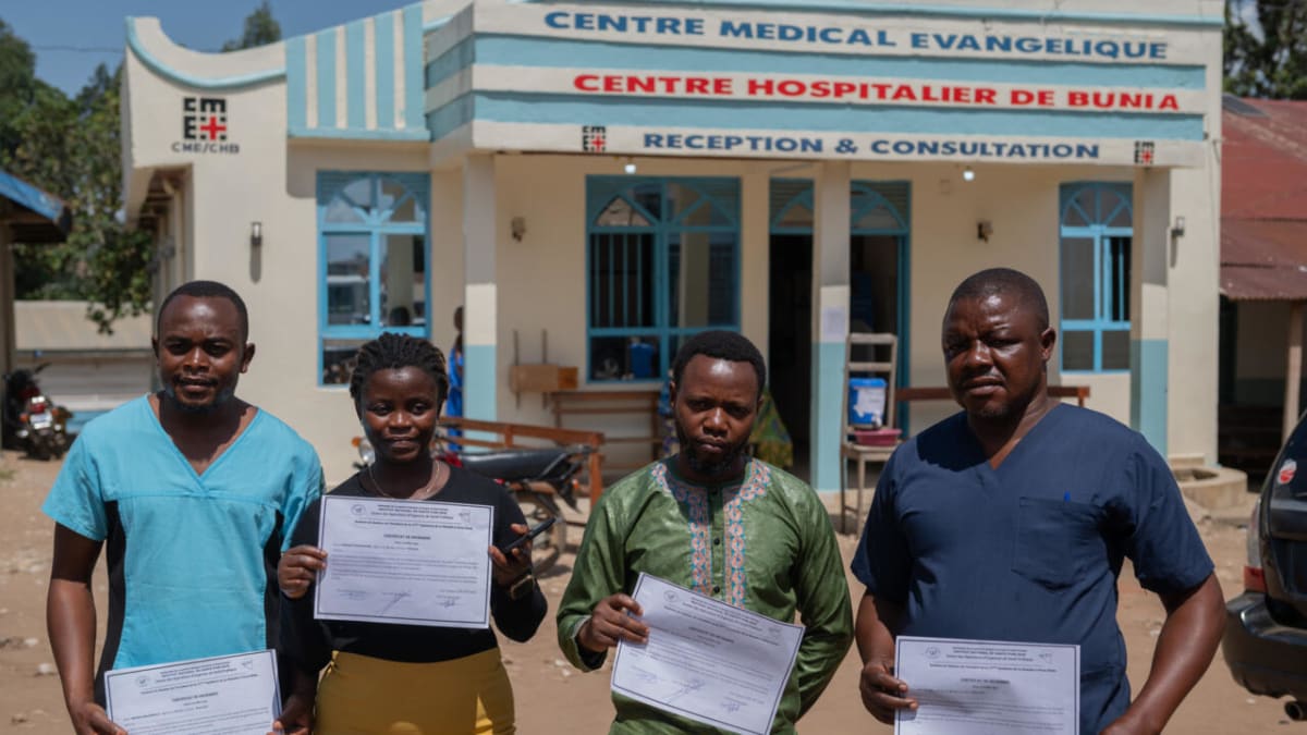 Healthcare workers who recovered from Ebola standing together in Bunia, Democratic Republic of Congo