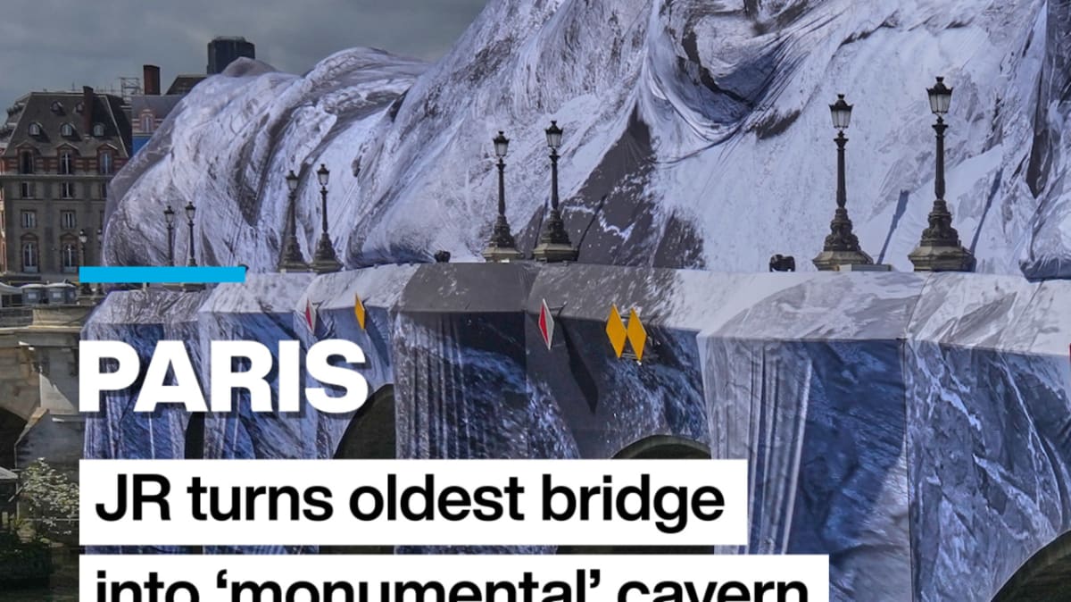 Historic Paris bridge Pont Neuf transformed into immersive mountain cave art installation by artist JR