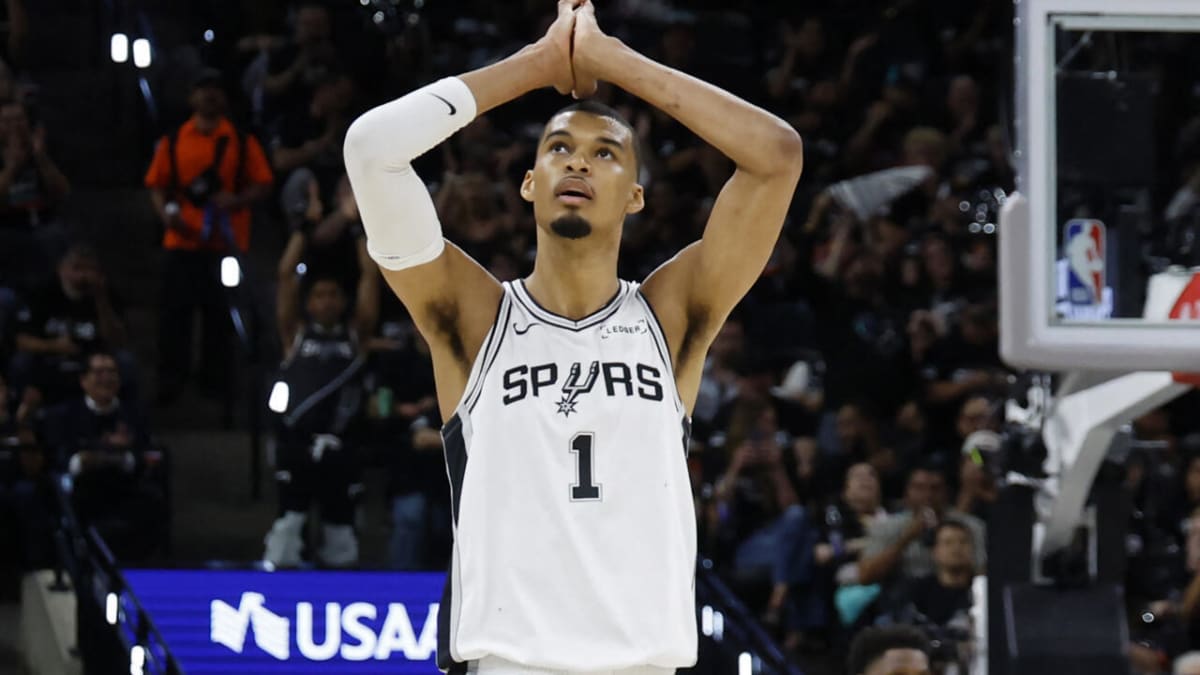 Victor Wembanyama in San Antonio Spurs jersey playing during NBA playoff game