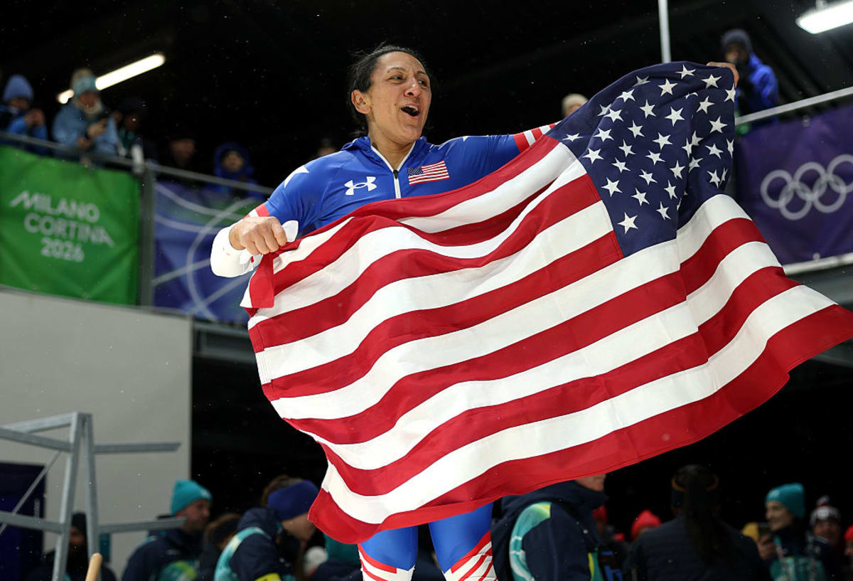 Elana Meyers Taylor celebrates with gold medal after winning women's monobob at 2026 Winter Olympics