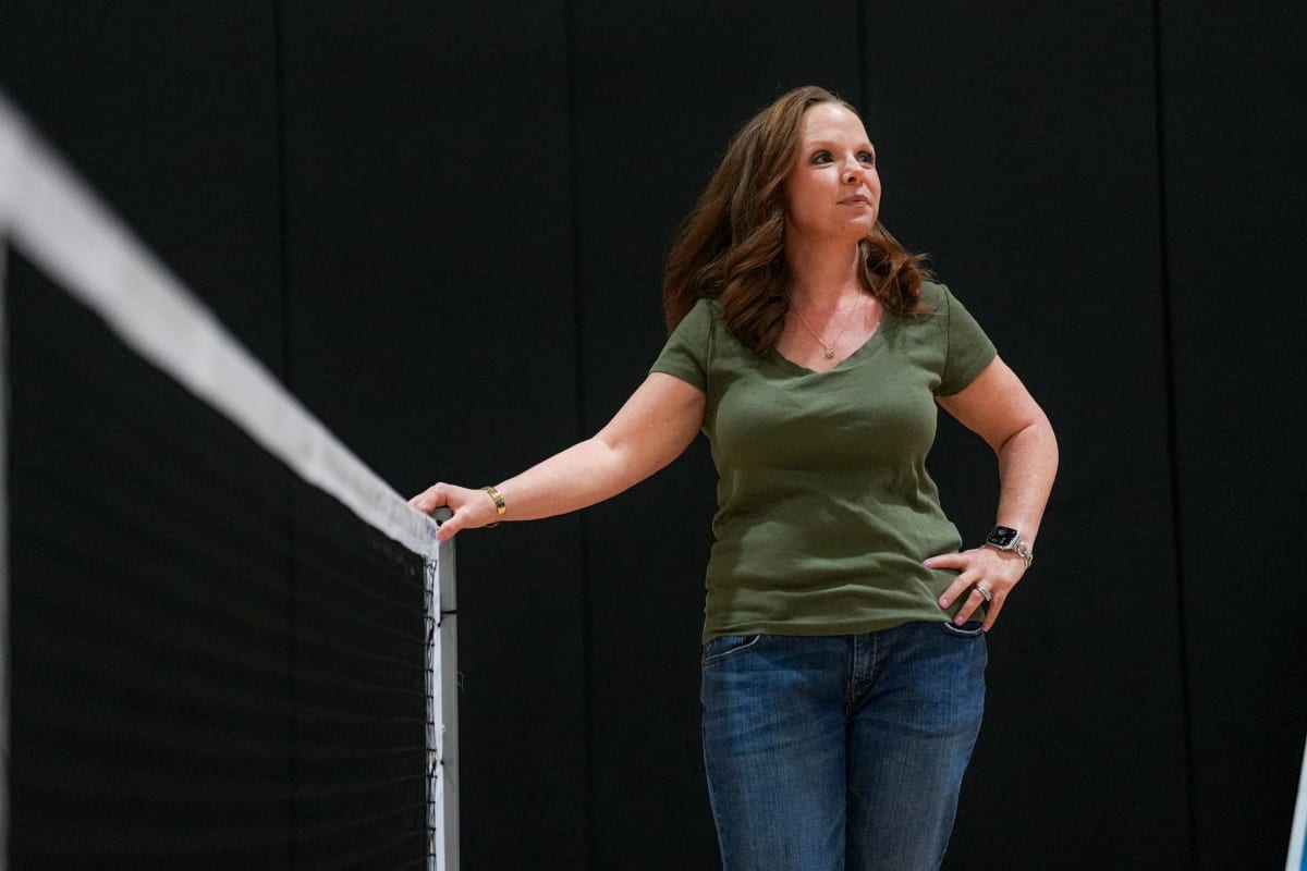 Tyler Hobson and Jonathan Goetz stand together smiling at Brushy Creek Community Center pickleball court