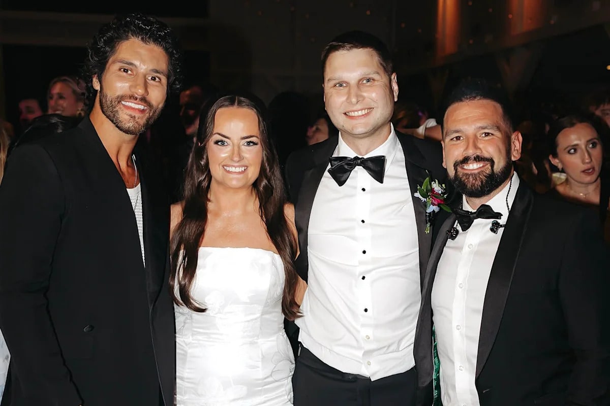 Country duo Dan and Shay pose with bride Emily Hood Weiss at her Tennessee wedding reception