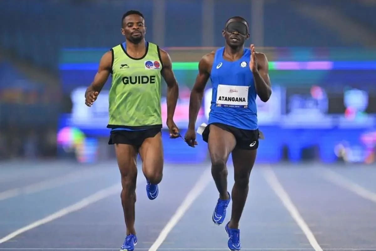 Guillaume Junior Atangana celebrates winning gold in 400-meter race at World Para Athletics Championships