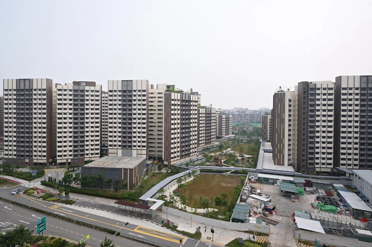 Modern apartment complex in Singapore's Tengah neighborhood featuring innovative construction technology and green spaces