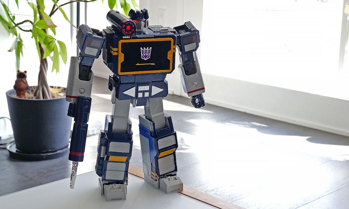 ** Fourteen-inch Soundwave robot with blue and silver coloring standing in transformed robot mode