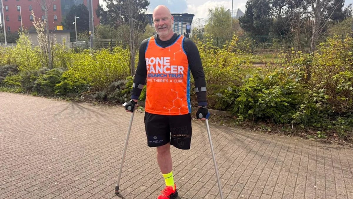 Peter Lloyd training on crutches for the Manchester Marathon world record attempt