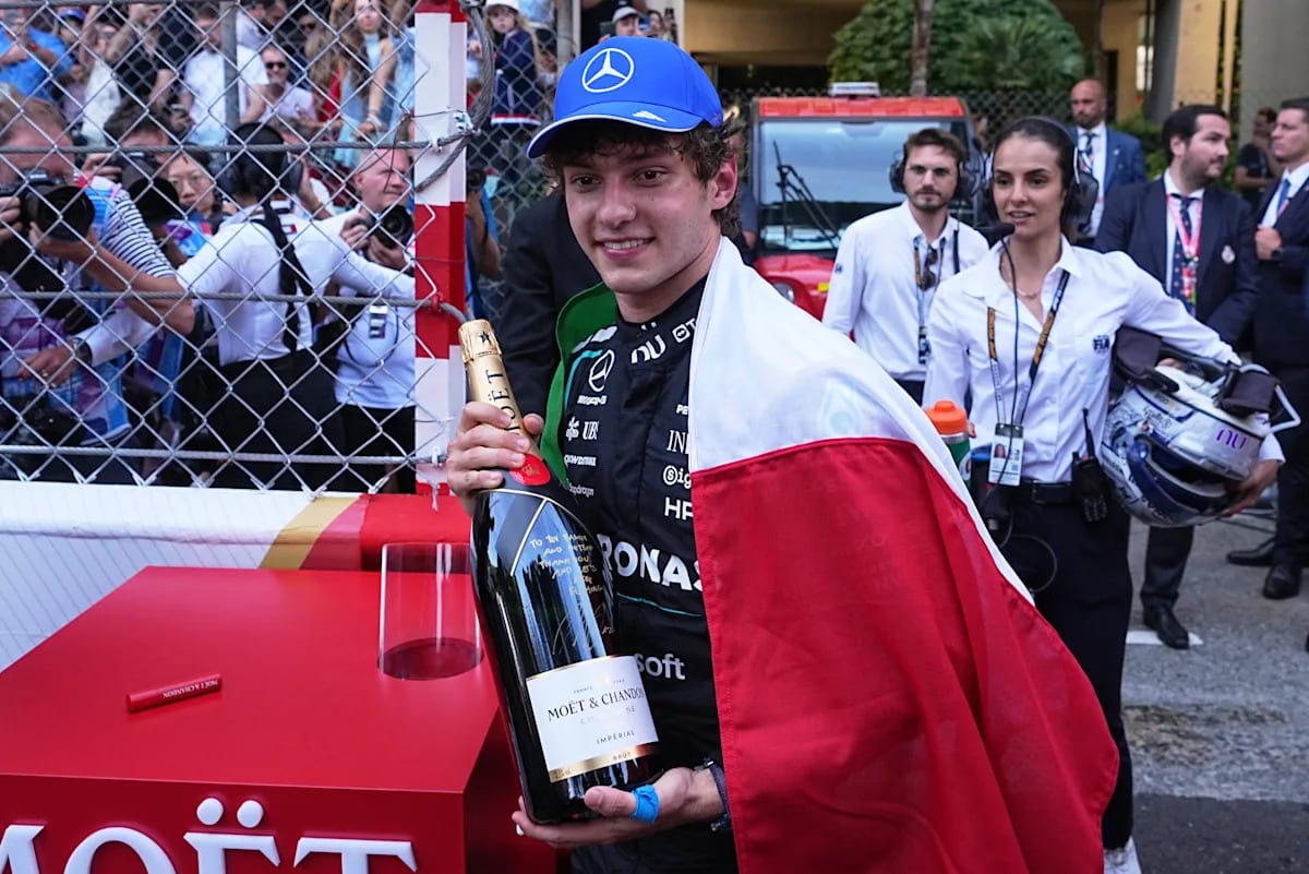 Young Italian F1 driver Kimi Antonelli celebrates victory at Monaco Grand Prix podium