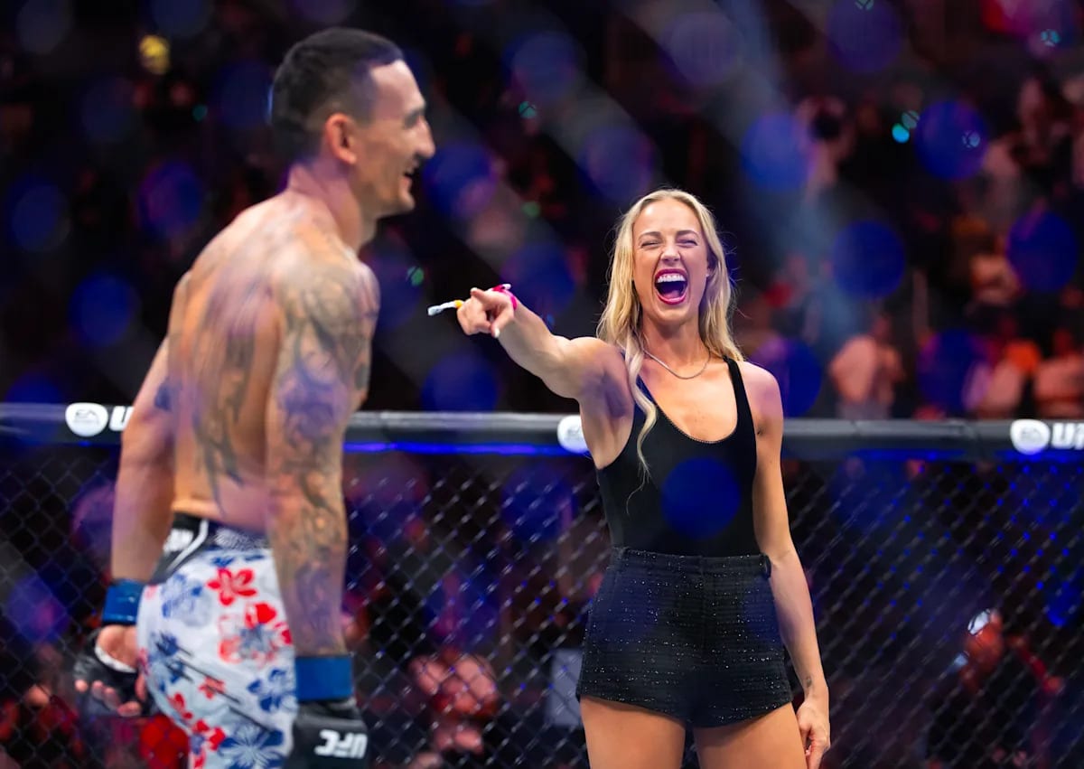 Max Holloway and Sophie Cunningham pointing at each other in UFC Octagon