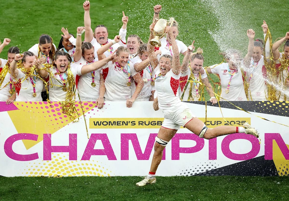 England's Red Roses rugby team celebrating their 2025 World Cup championship victory at Allianz Stadium