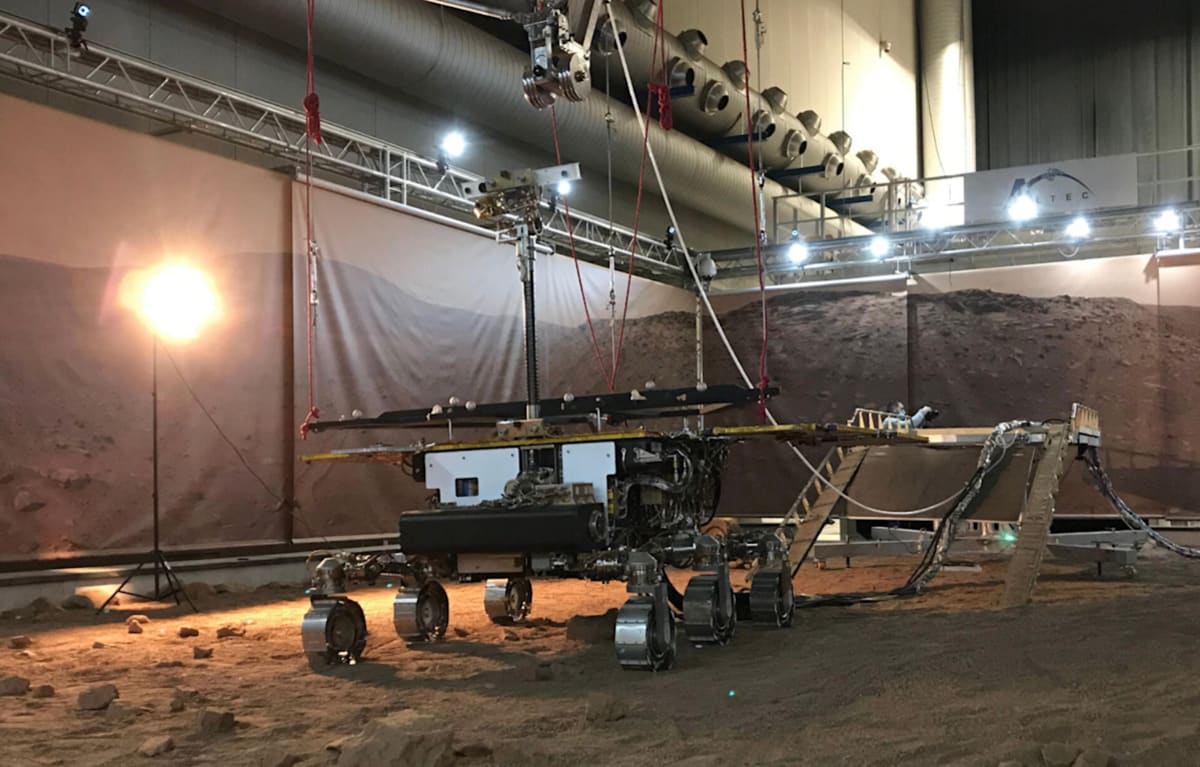 Artist rendering of the Rosalind Franklin rover exploring the rust colored Martian surface