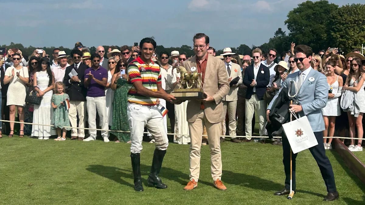 Polo players on horseback competing at Guards Polo Club during Indian Polo Day celebration