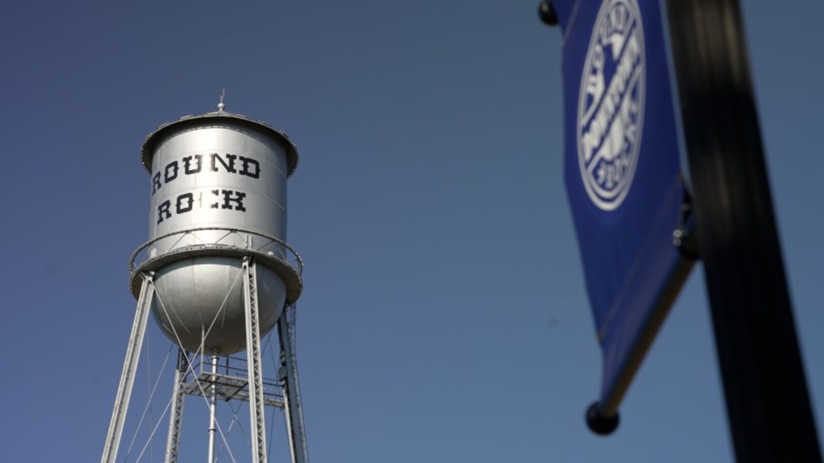 Startup founders collaborating in Round Rock Texas business accelerator program workspace