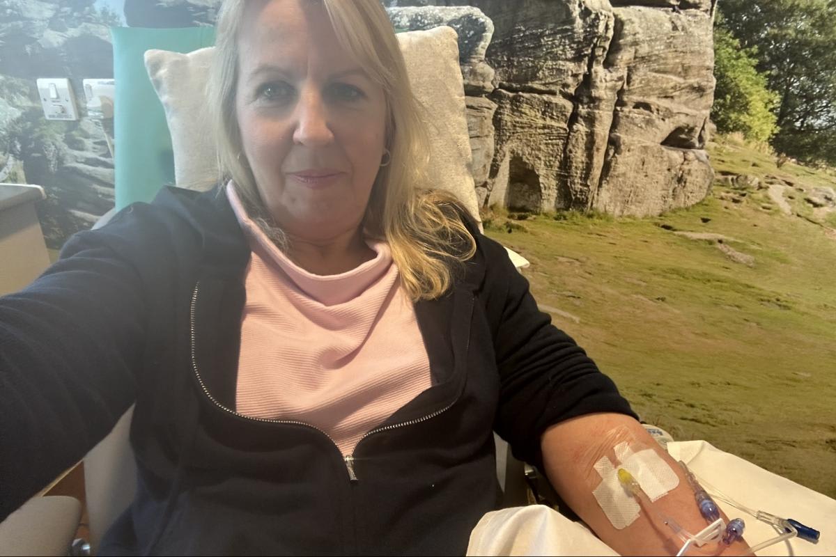 Sandra Breene and husband Alan smiling together in running gear before London Marathon training