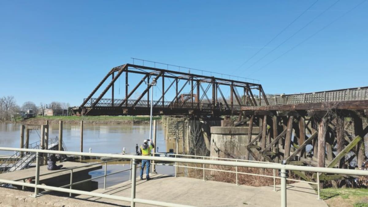 Volunteers Crank 12-Person Bridge for Historic Inspection - Image 2