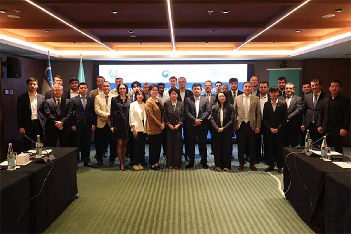 Modern clean energy facility in Uzbekistan with hydrogen production equipment under blue sky