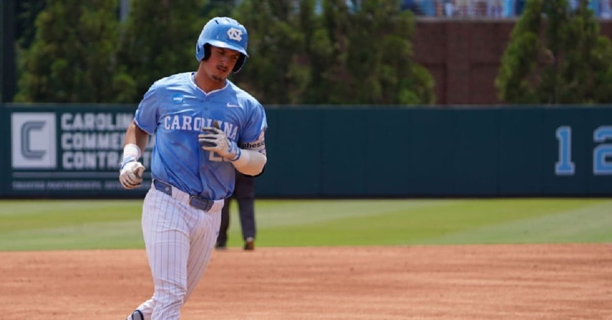 North Carolina pitcher Jason DeCaro celebrating on mound after complete game shutout victory