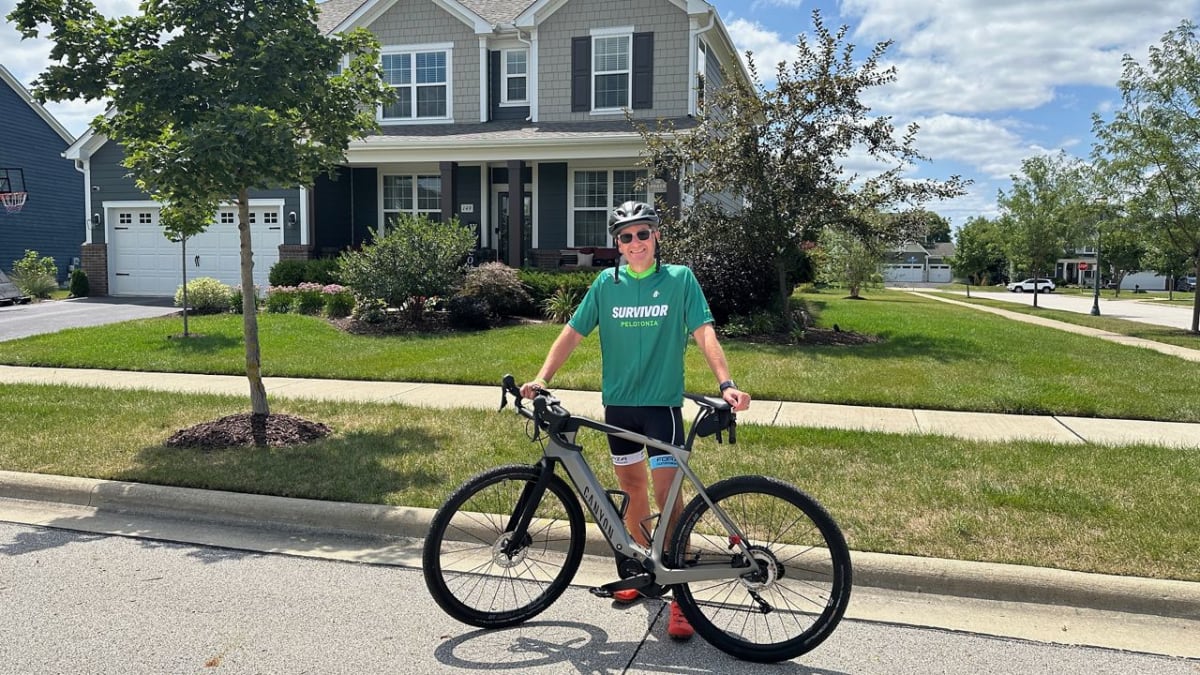 Steven Smith riding bicycle in Pelotonia charity event for cancer research funding