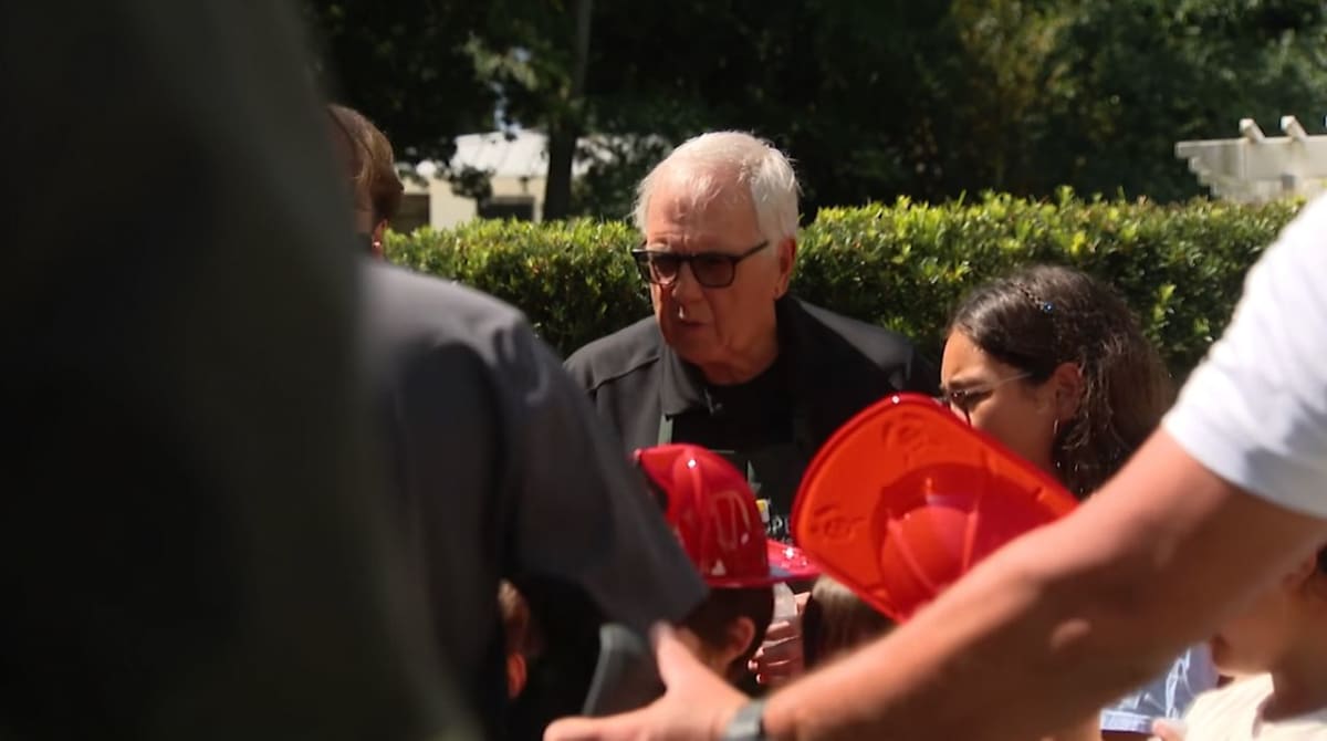 Volunteer Robert Talley helping children at New Hope for Kids grief support center in Maitland