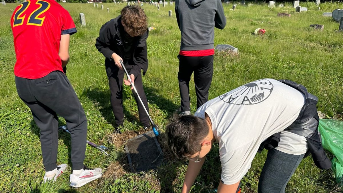 Louisville Students Clean Historic Cemetery for Families