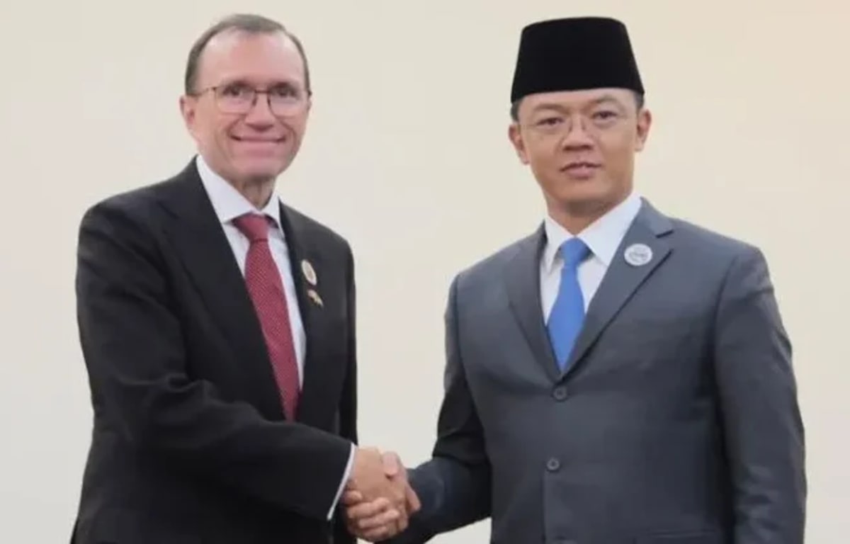 Indonesian and Norwegian flags side by side representing climate partnership and cooperation