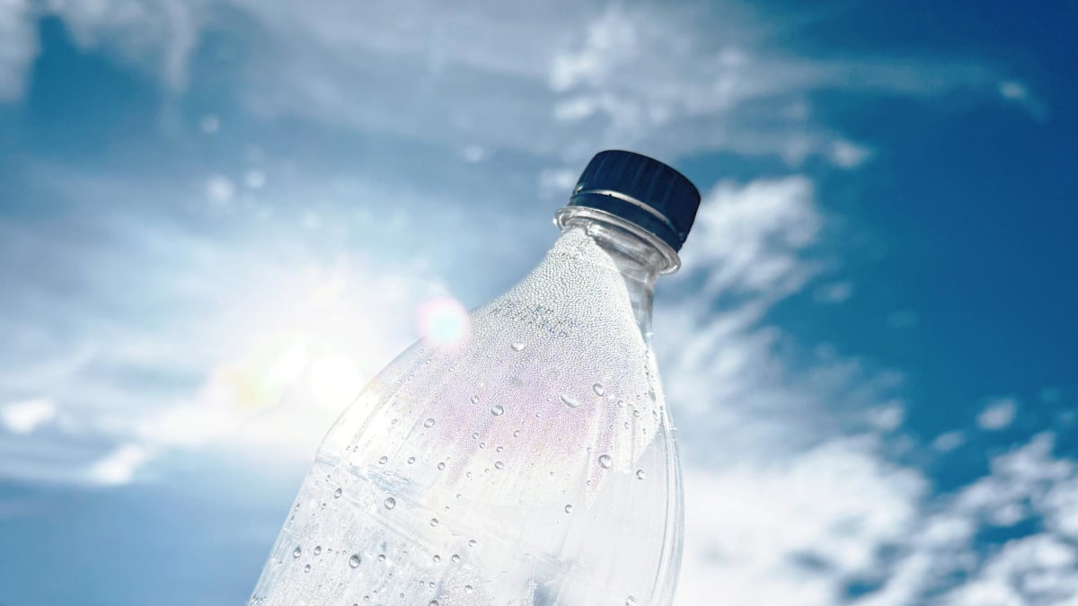 Plastic waste being transformed into clean energy using sunlight in laboratory setting