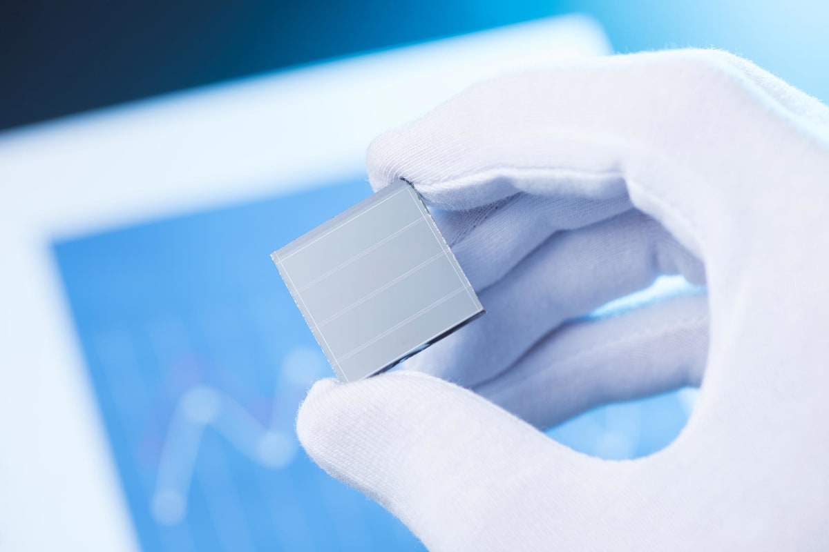 Hybrid solar panel with protective coating generating electricity from both sunshine and rainfall