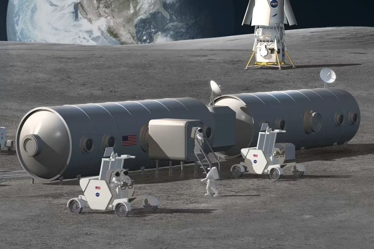 NASA concept art showing futuristic lunar base with habitat modules at moon's south pole