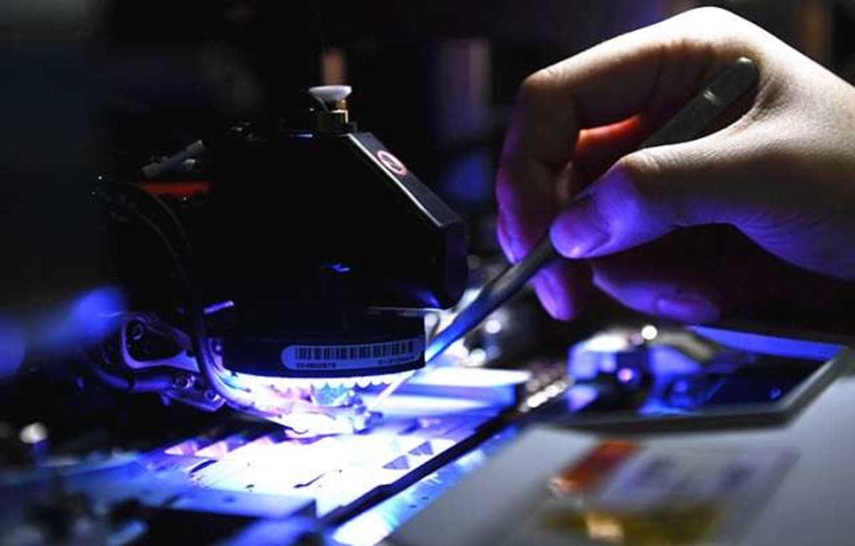 High-tech semiconductor manufacturing machine using extreme ultraviolet light to etch microscopic chip patterns