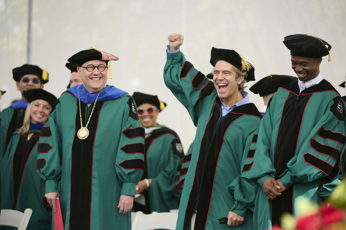 Emmy winner Andy Cohen celebrates at Washington University commencement ceremony with graduates cheering