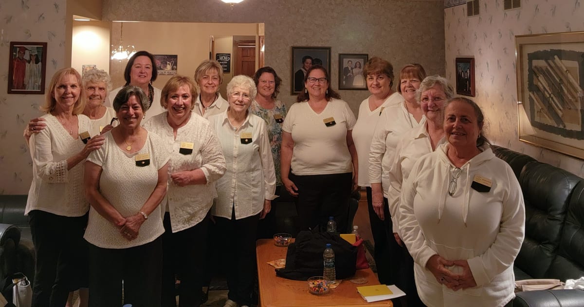 Women gathering together in support of educational scholarships and sisterhood through P.E.O. organization