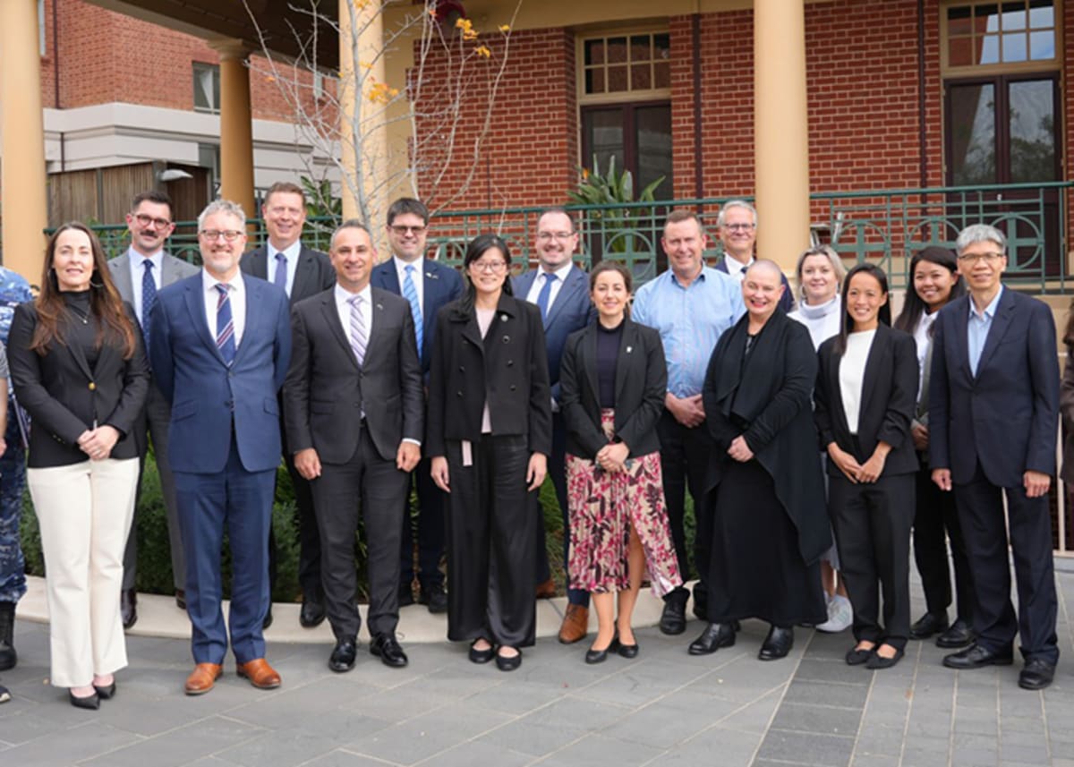 Australian and Singapore space agency officials meeting in Adelaide discussing satellite technology collaboration