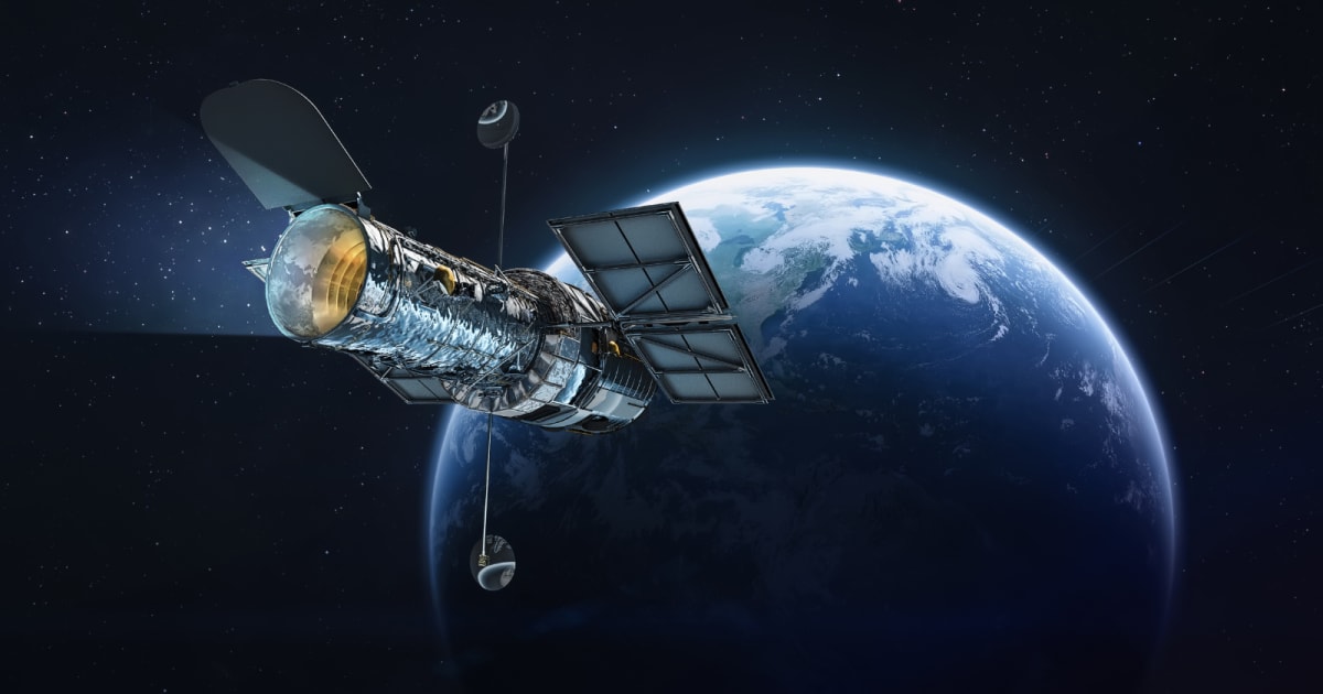 Artist's rendering of NASA's Roman Space Telescope with solar panels deployed in orbit