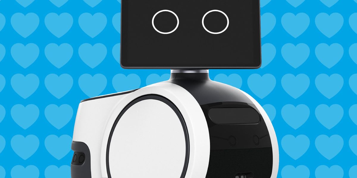 Amazon Astro home robot with animated screen displaying large expressive eyes on wheeled base