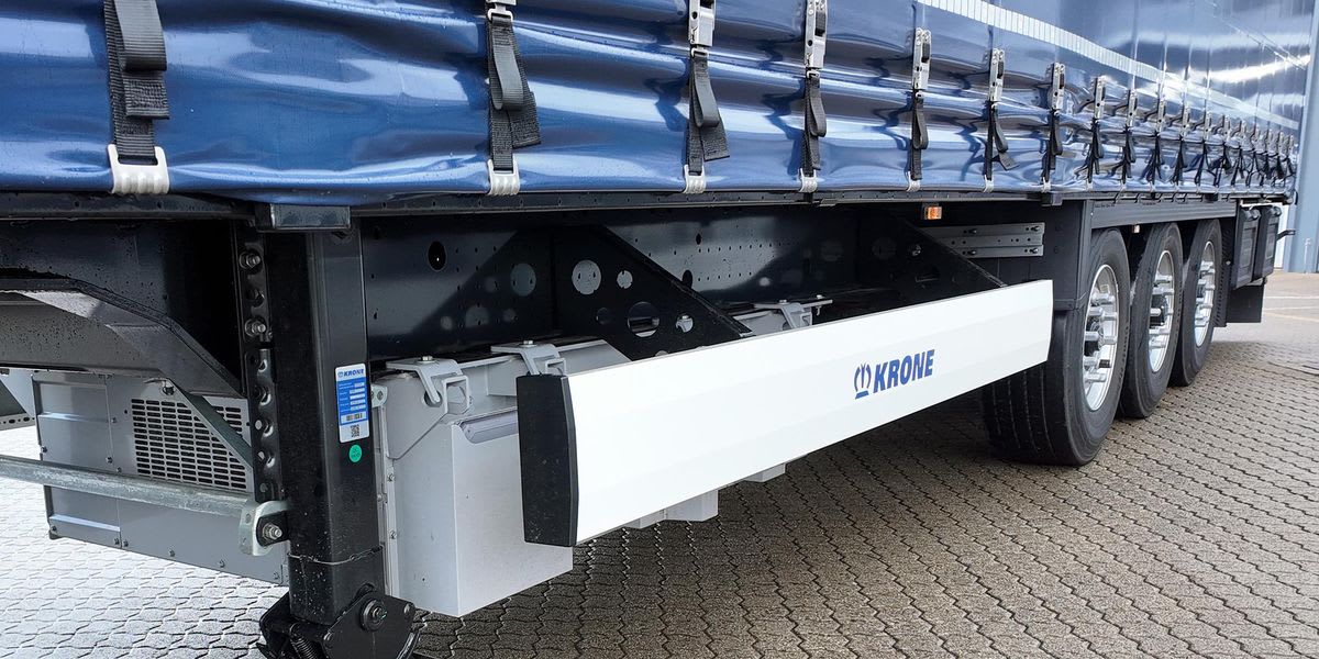 Semi-trailer with rooftop solar panels and electric axle system on European highway